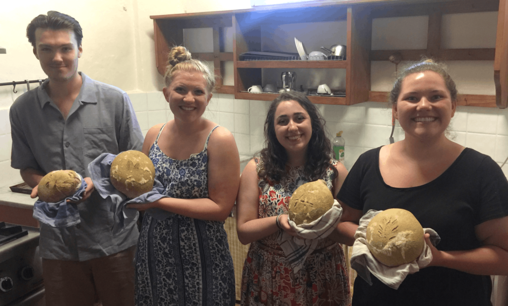 four students with their bread