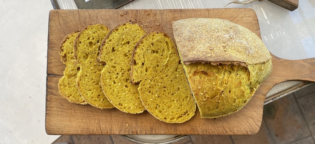 Loaf and slices of turmeric bread